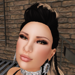 A female Second Life avatar smiles at the camera.