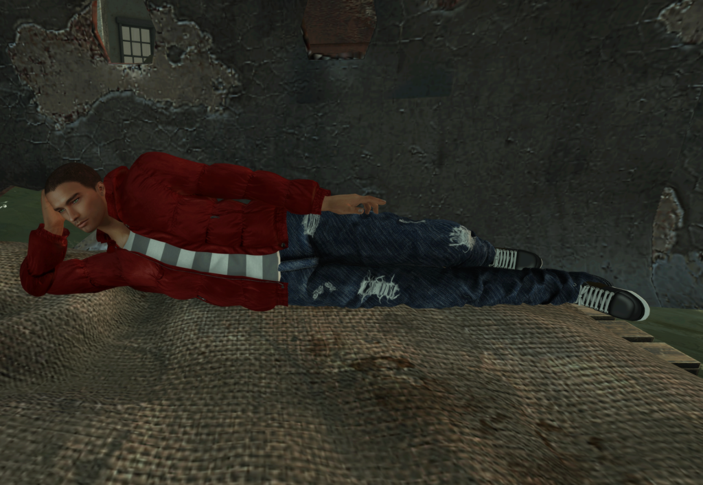 A male Second Life avatar lays in a dirty bed.