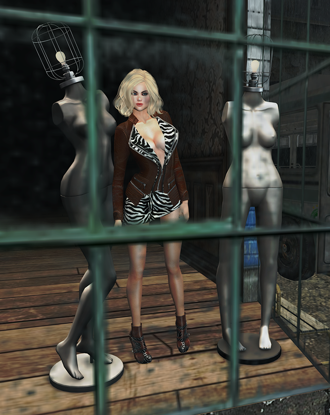 A female Second Life avatar wears a leather and zebra pattern jacket and skirt set.