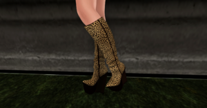 A Second Life woman shows off her boots from The Free Dove