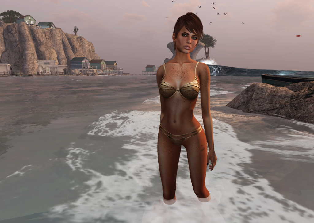 A  female Second Life avatar in a bikini at the beach.