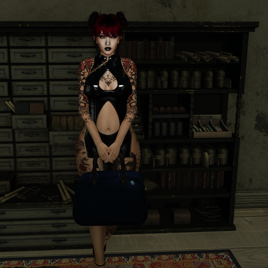 A Second Life avatar with red hair and a black dress stands with a bag in front of messy shelves.
